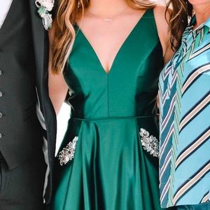 Selling my prom dress size 6! Beautiful satin, emerald green dress.